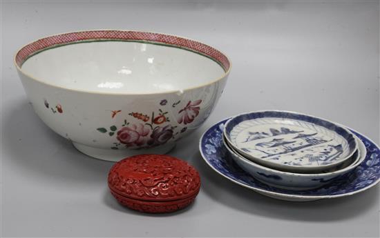 A Qianlong famille rose bowl and three blue and white plates